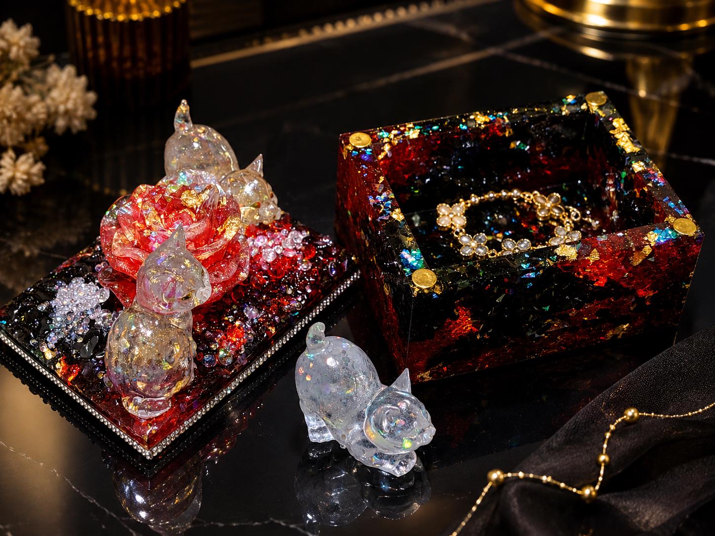 The Crimson Rose Heirloom Box, a sculpted crimson rose on a resin lid flecked with gold.